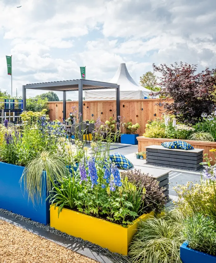 Frame Patio and Seating Areas with Raised Garden Beds